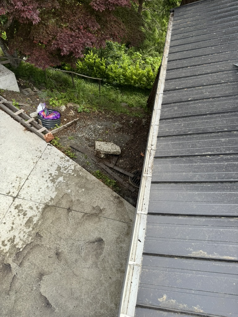 Clean metal gutter run after service