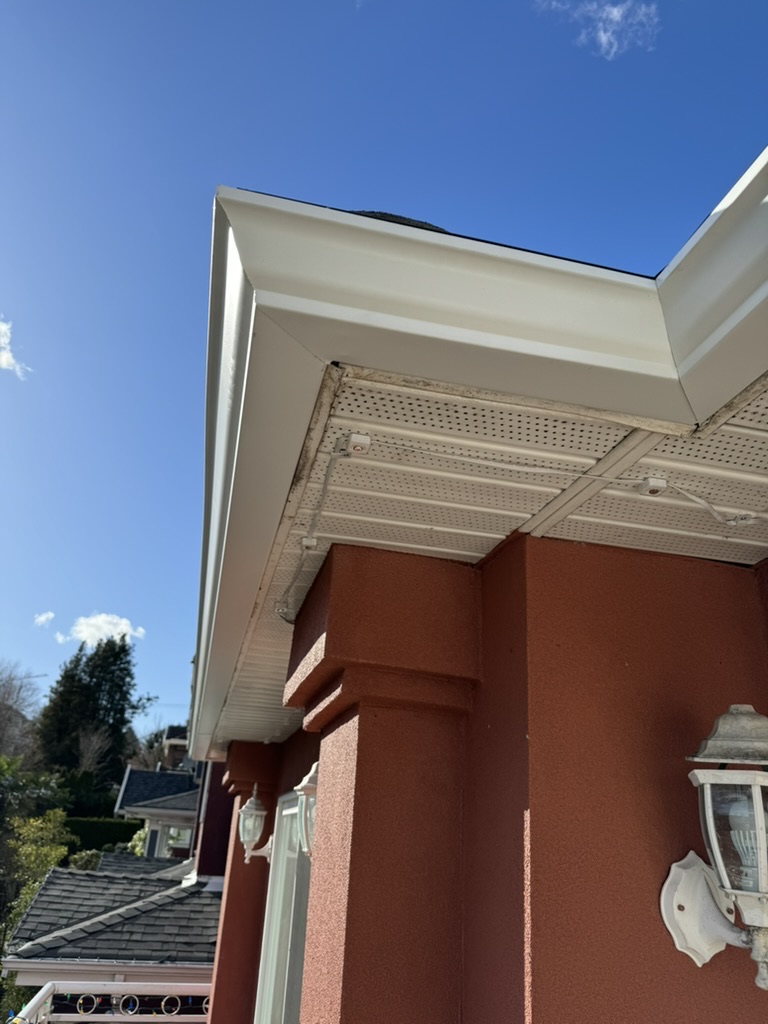 Finished white gutter and soffit corner detail
