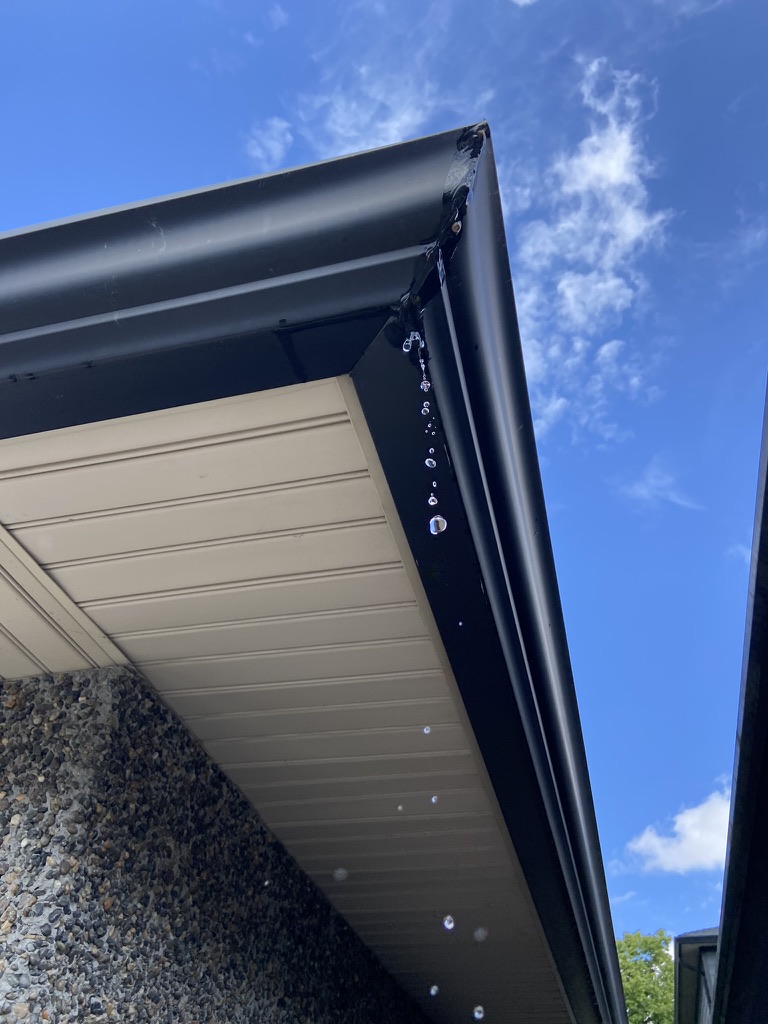 Water dripping from a failed gutter joint