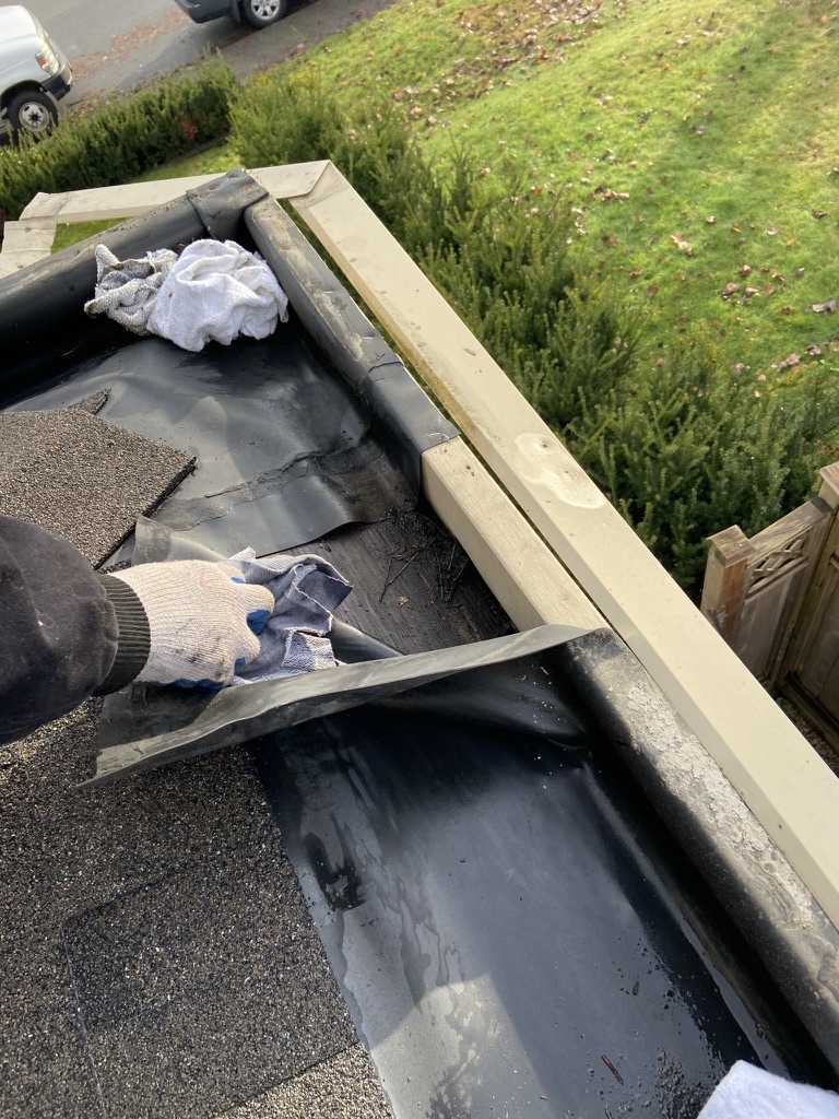 Gutter repair area being cleaned and prepared