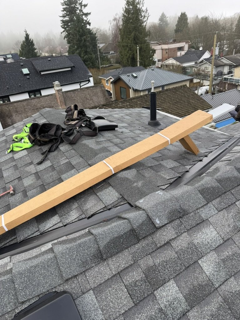 Roofing work set up on a damp coastal BC roof