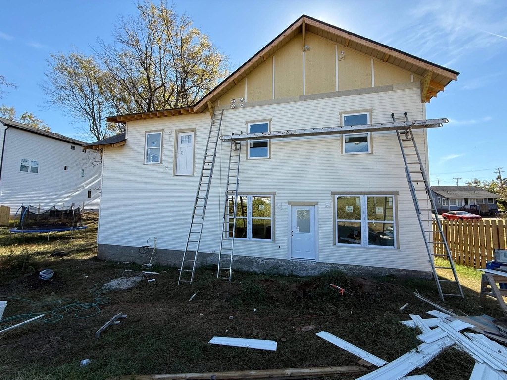White siding installation full wall view