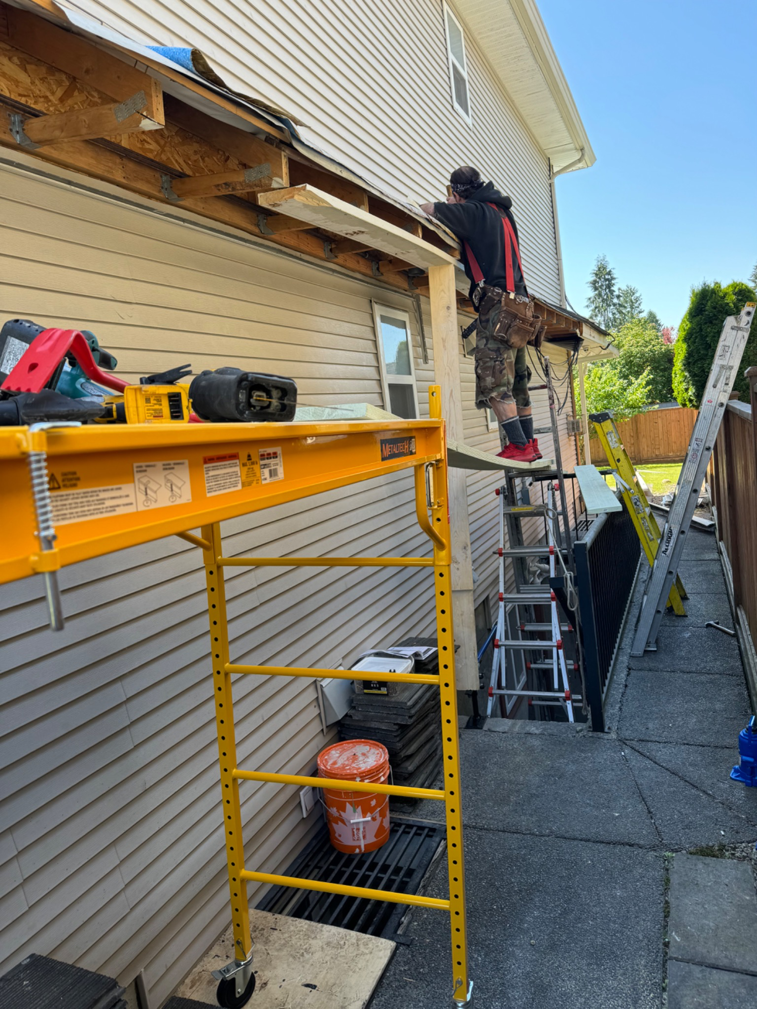 Fascia and soffit structural repair with scaffold access