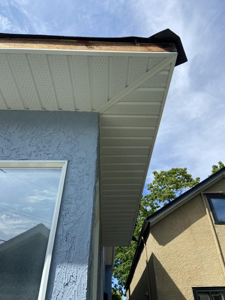 Finished soffit installed above a window