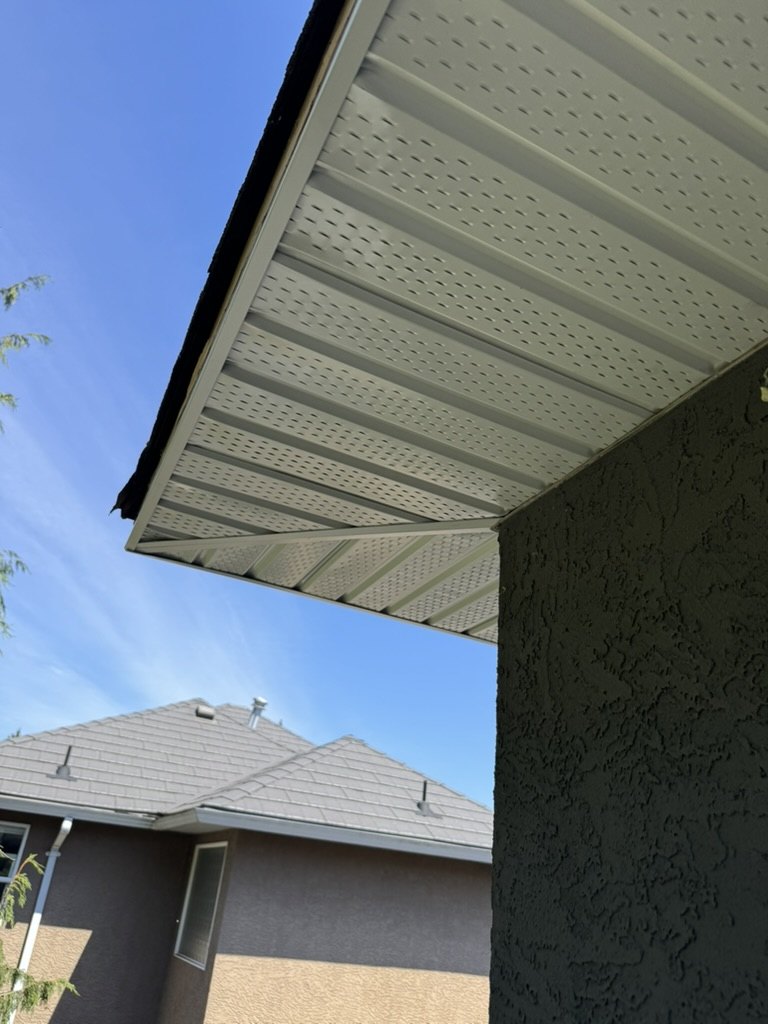 Finished vented soffit installed under an eave
